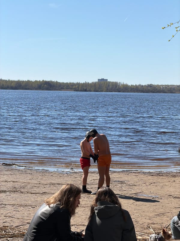 Swimmers enjoy sunny beach day in Saint Petersburg