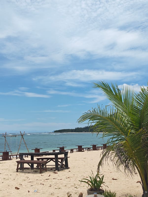 Beach picnic setup documented in Monikeun, Indonesia