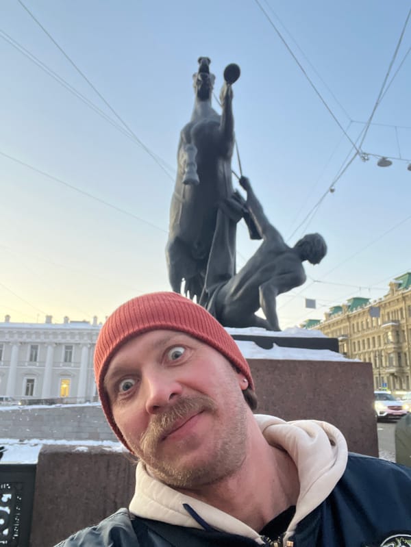 Tourist documents winter walk through historic Saint Petersburg landmarks