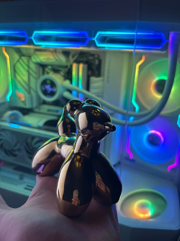 RGB PC build showcase with a quirky figurine collection