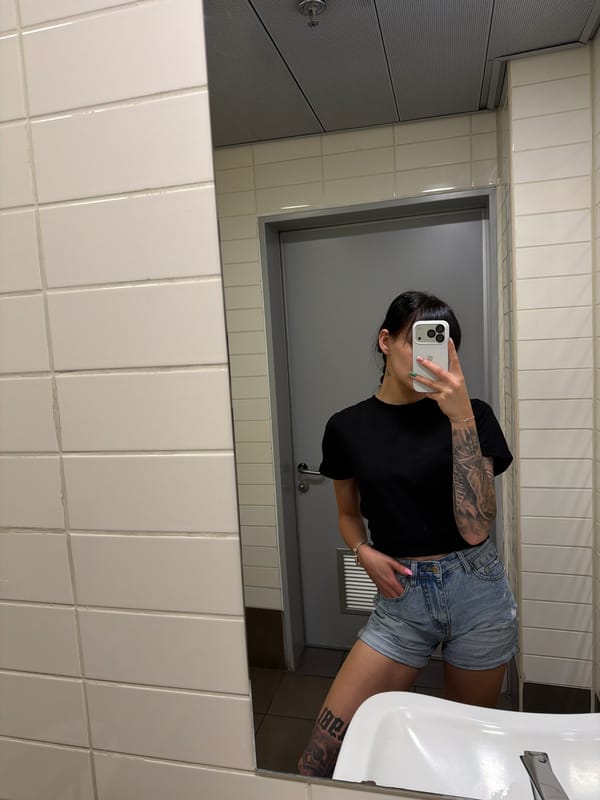 Mirror selfie taken in Plovdiv public restroom