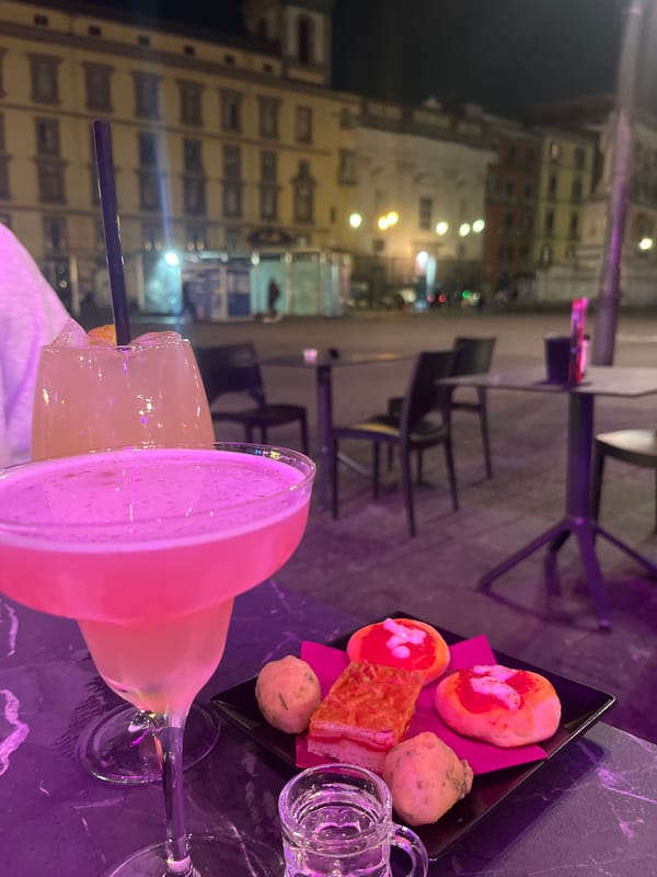 Evening dining captured at Naples restaurant with cocktail and appetizers