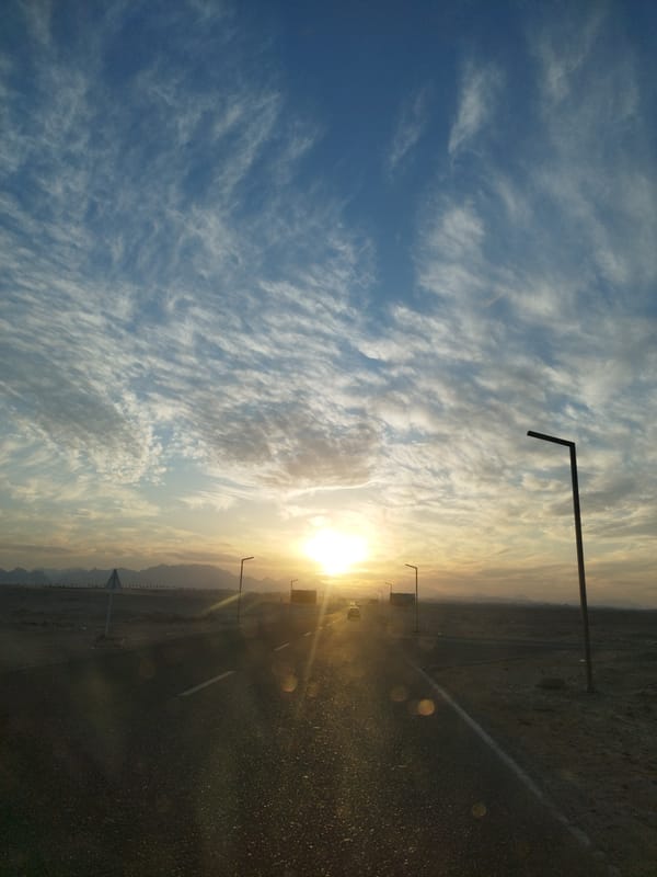 Sunset road photograph captured in arid Egyptian landscape