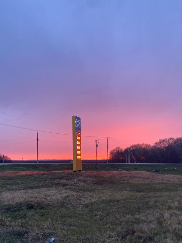 PTK gas station captured during colorful sunset in Russia
