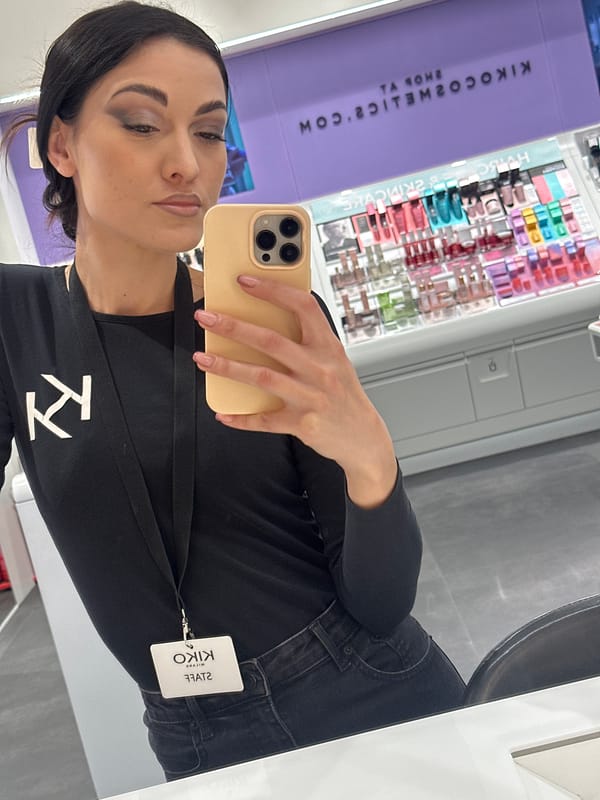 KIKO Milano employee takes selfies during work shift