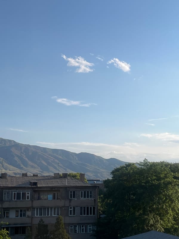 Sunny afternoon rooftop views across Gladzor, Armenia