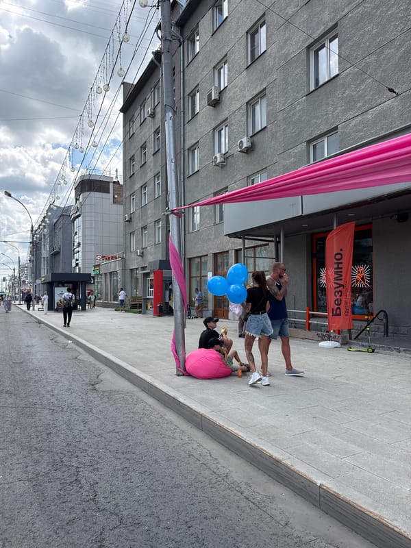 Novosibirsk street festival with vintage vehicles and anniversary celebrations
