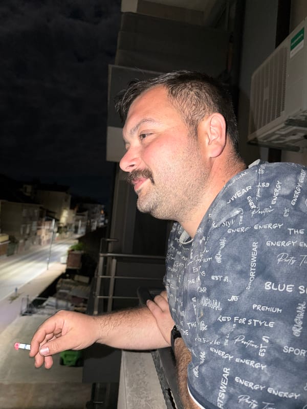 Man photographed smoking cigarette in Sandanski, Bulgaria