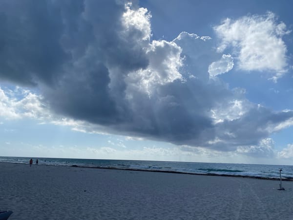 Beach scene documented in Playa del Carmen with footprints