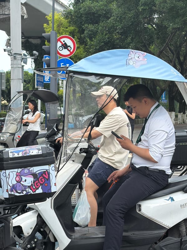 Early morning electric scooter activity in Chongqing tech district