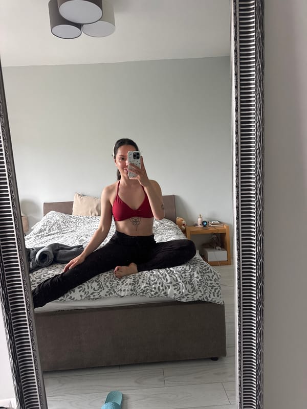 Woman takes playful mirror selfies in Burgas bedroom