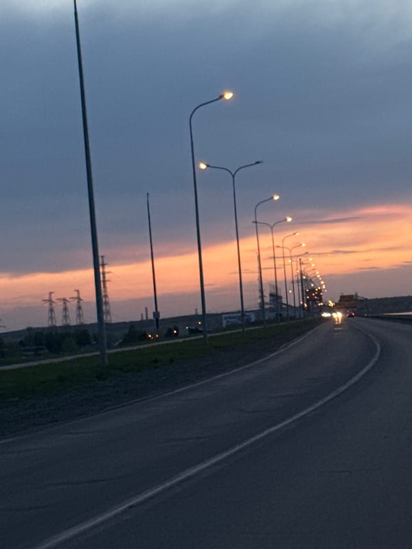 Twilight street scene captured in Chaikovsky, Russia