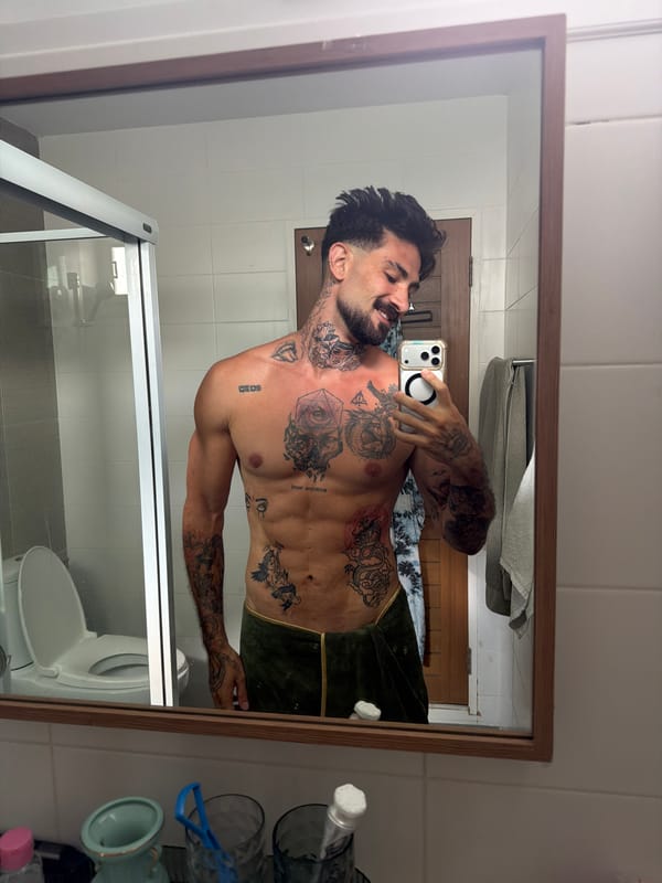 Man takes bathroom mirror selfies in Chalong, Thailand