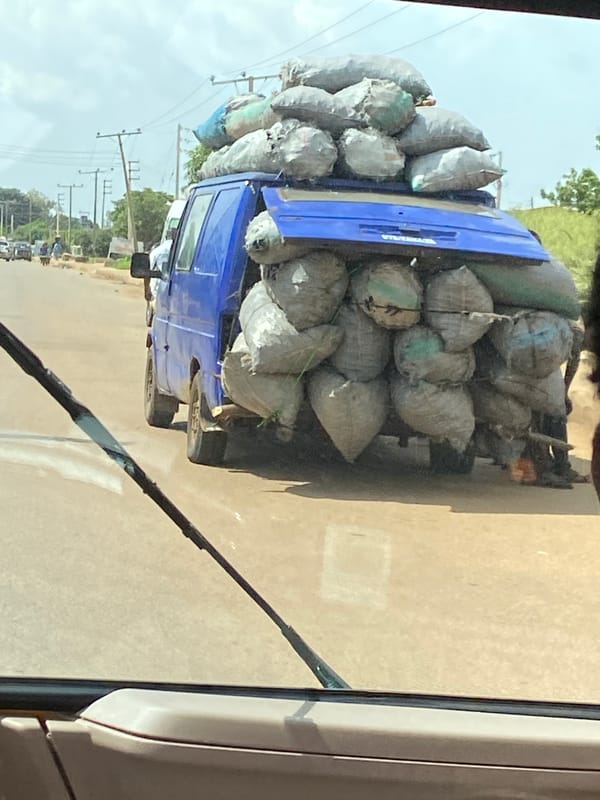 Afternoon commerce and street life in Bukuru, Nigeria