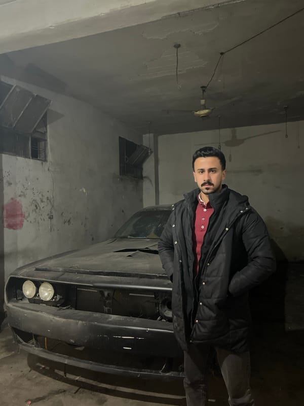 Damascus residents document motorcycle scenes, garage work during evening hours