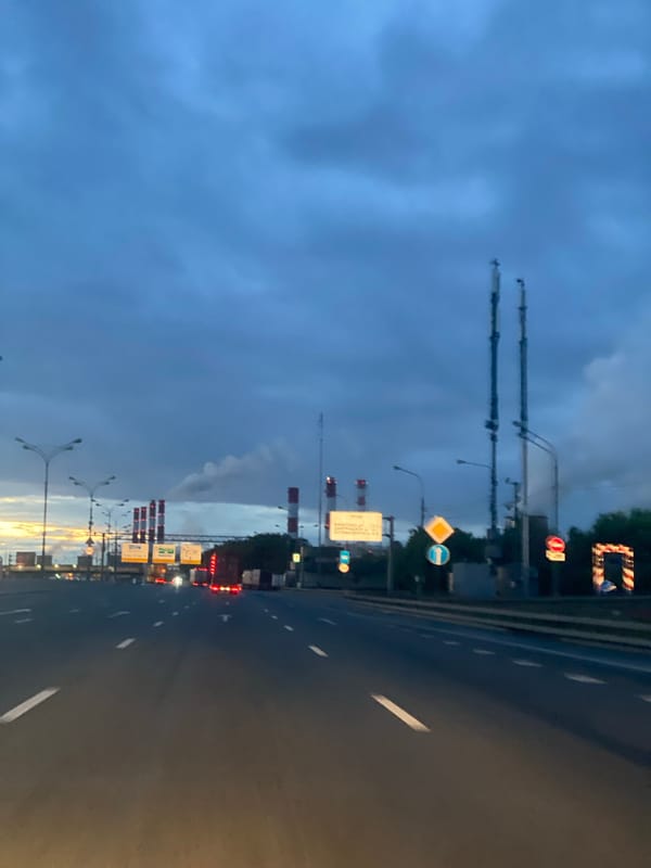 Evening highway traffic observed near Crocus City archway