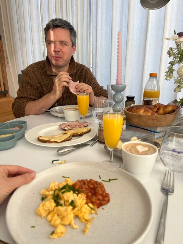 Morning view captures yellow excavator in rural Gangloff scene