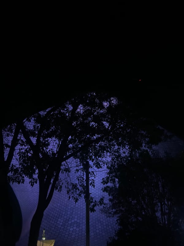 Illuminated hexagonal structure observed across Mexico City nighttime
