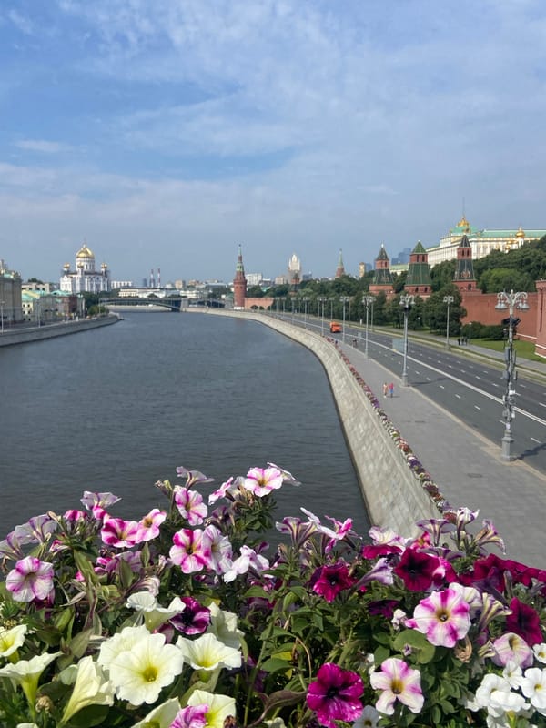 Moscow's iconic landmarks framed by summer flower beds