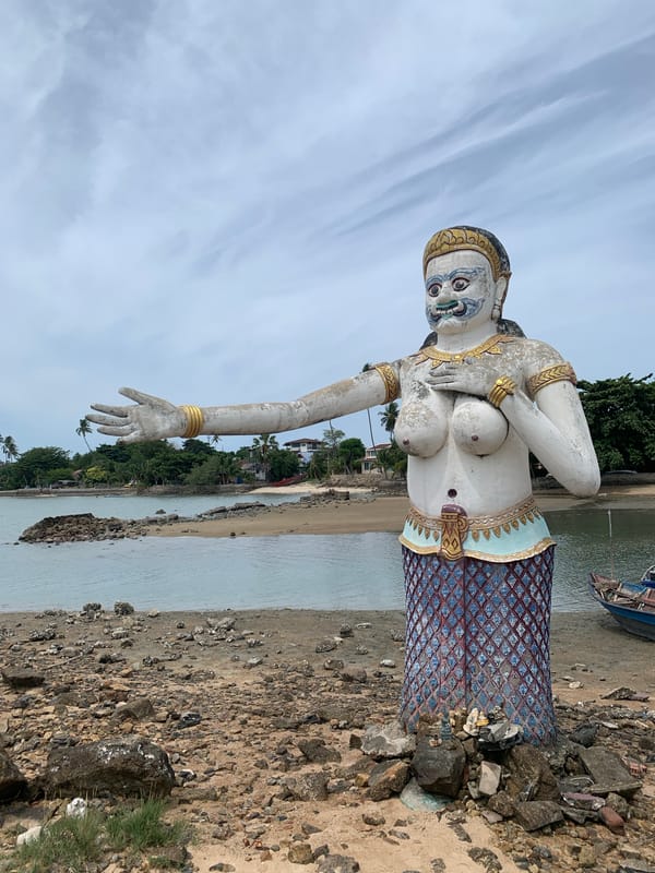 Ko Samui temple statues and resort grounds on a quiet morning