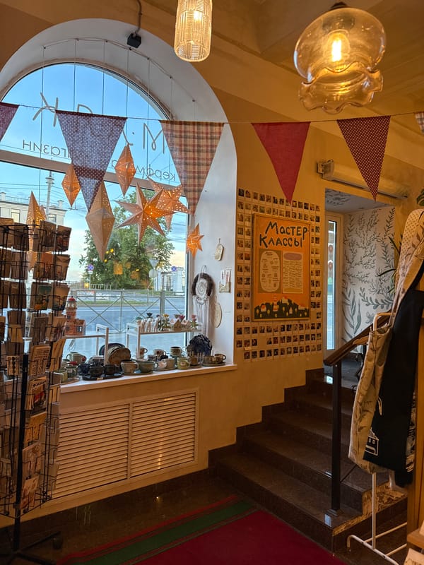 Visitor browses souvenir shop displays in Vladimir, Russia