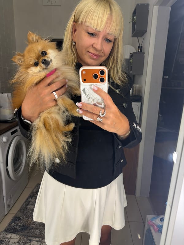 Woman Takes Late-Night Selfies with Dog in Chaikovsky Bathroom