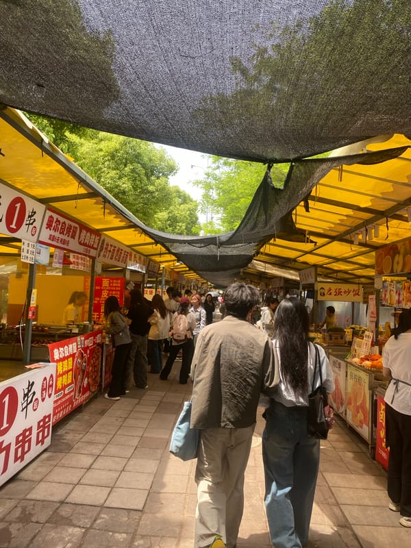 Early morning food market bustling in Shapingba District