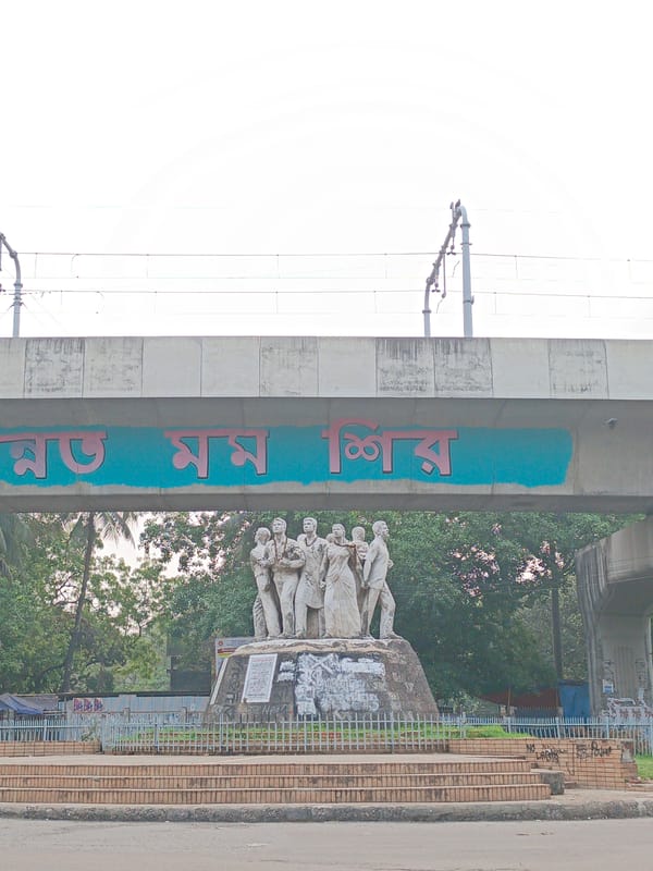 Daily street maintenance near Bangladesh Liberation War memorial