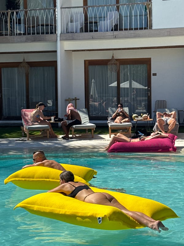 Early morning poolside relaxation documented at North Kuta resort