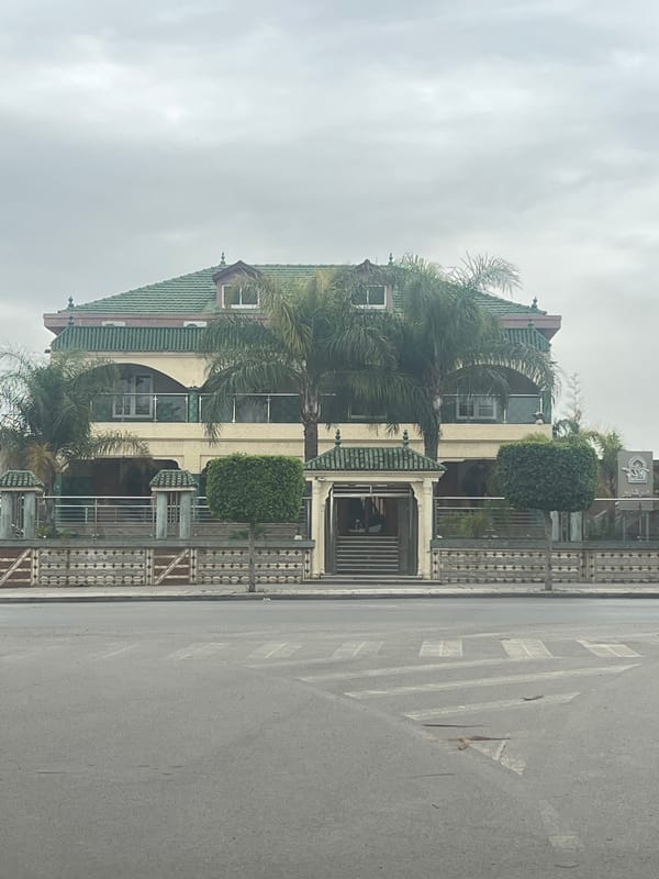 Three-story building with green roof observed in Meknes, Morocco