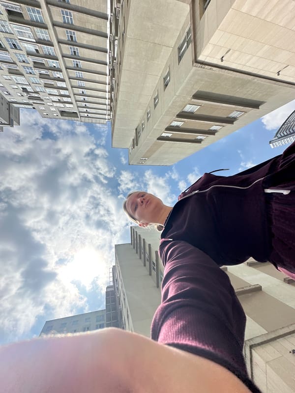 Woman documents outing with child in Esenyurt apartment district