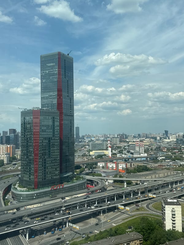 Morning views capture Khimki's highways and distinctive red-striped skyscraper