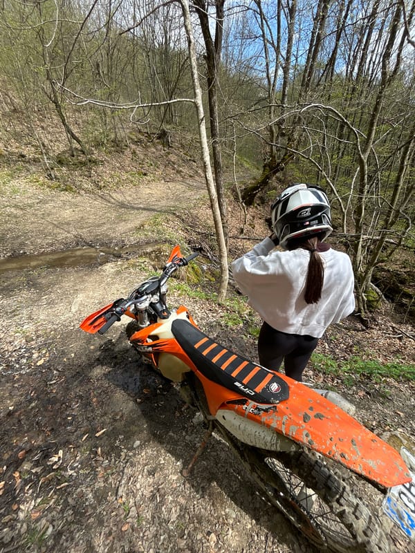 Dirt bike falls over in Bulgarian woods