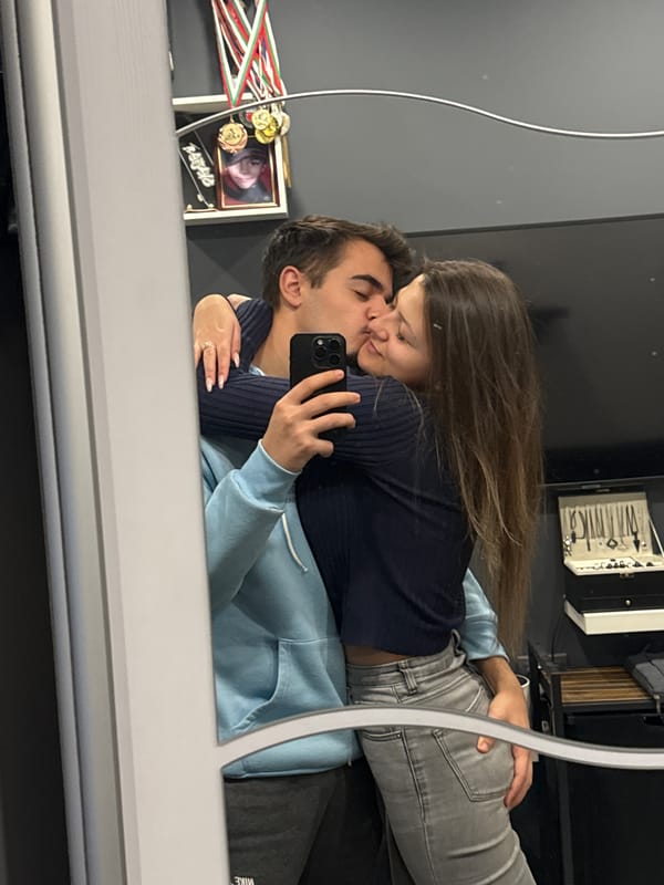 Couple takes romantic selfies in mirror in Sofia