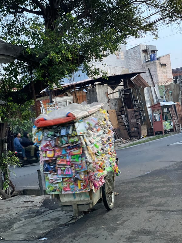 Evening street commerce captured in North Jakarta