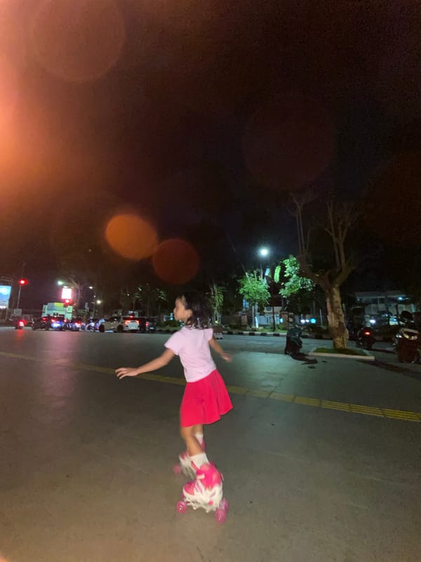 Child learns roller skating at Indonesian plaza