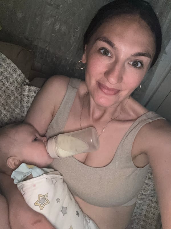 Mother feeds baby at home in Sochi residence