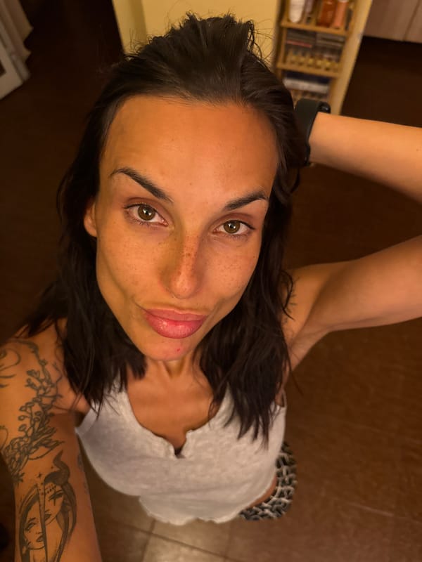 Tattooed arm raised in a casual summer pose, Pleven