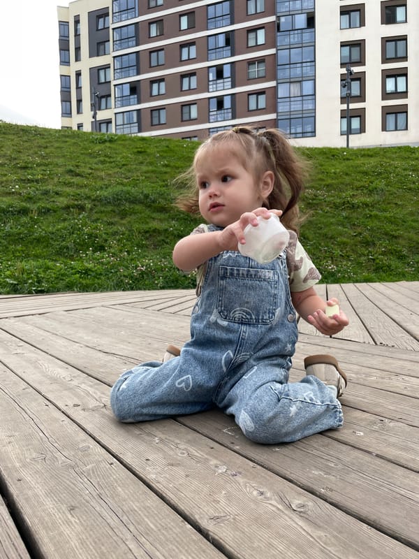 Relaxing on a wooden deck in a residential Izhevsk neighborhood