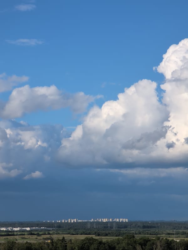 Rooftop sky-watching over Saint Petersburg's sprawling residential skyline