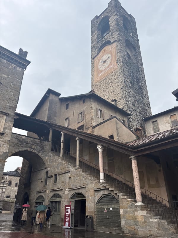 Tourist captures rainy morning tour of Bergamo's medieval district