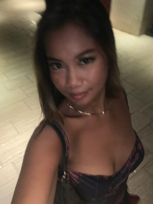 Young women document evening resort visit in Kuta Selatan