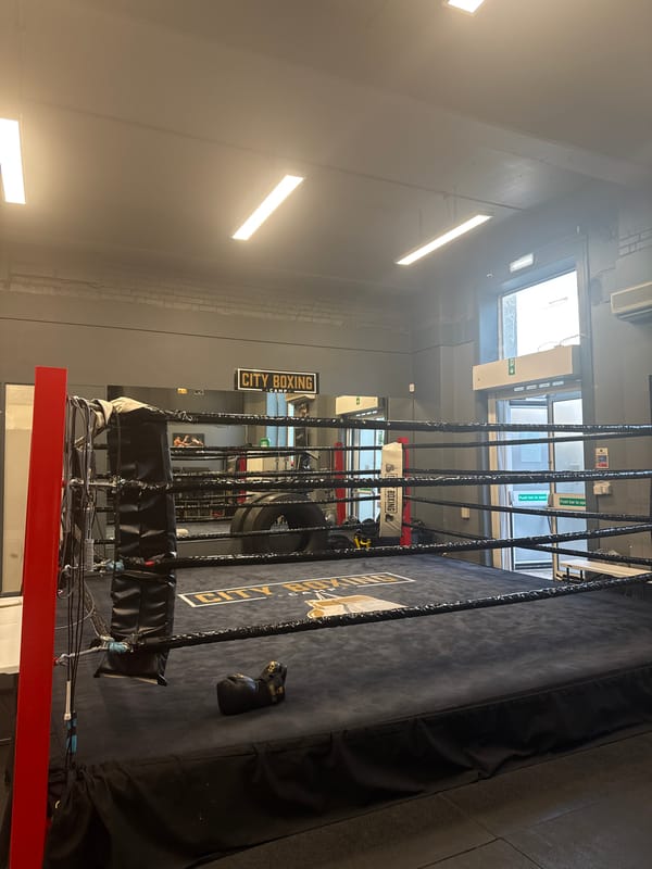 Empty London boxing gym documented during quiet afternoon period
