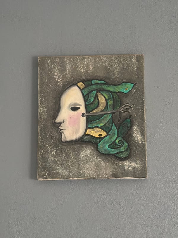 Art displays observed in Cuautla featuring abstract and skull paintings