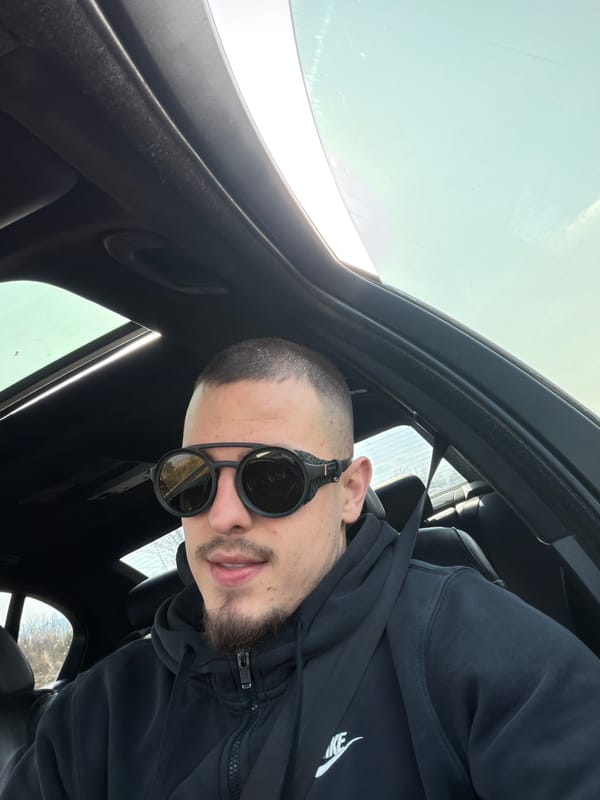 Man in Nike hoodie photographed in car near Plovdiv