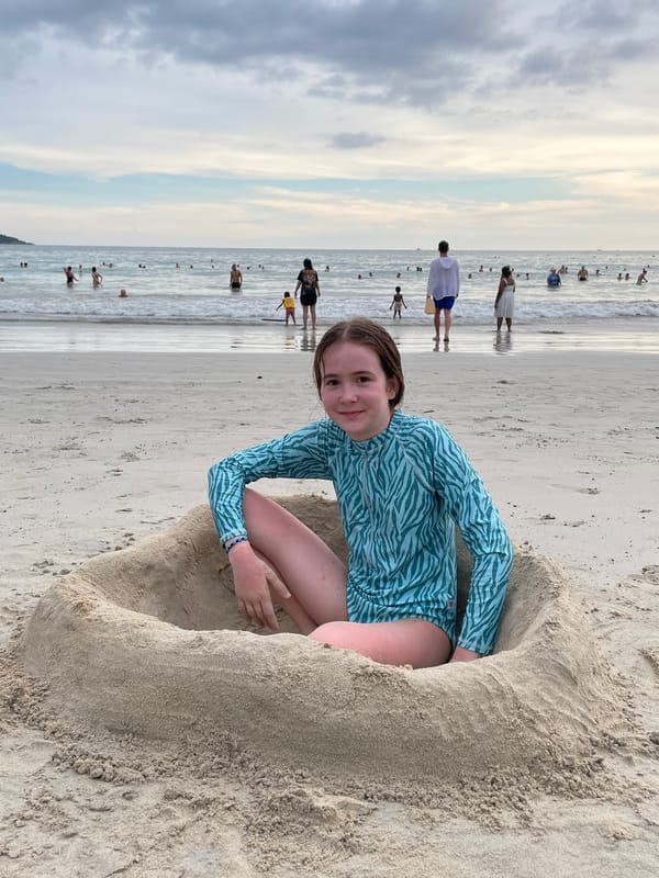 Typical beach day unfolds at Karon Beach, Thailand