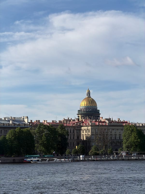 Tourist documents Saint Petersburg landmarks during early morning walk