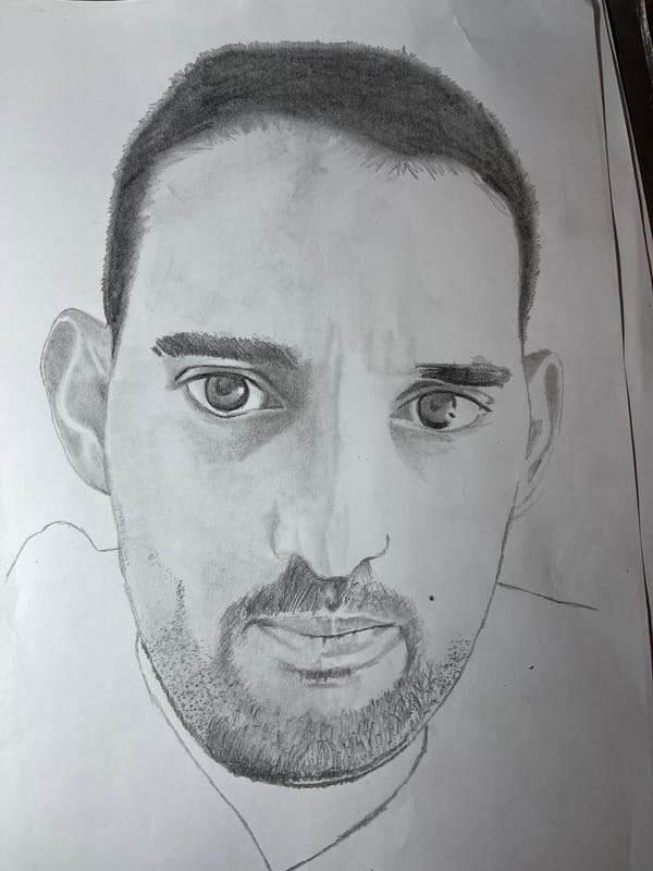 Artist sketches portrait from laptop reference photo in Jos