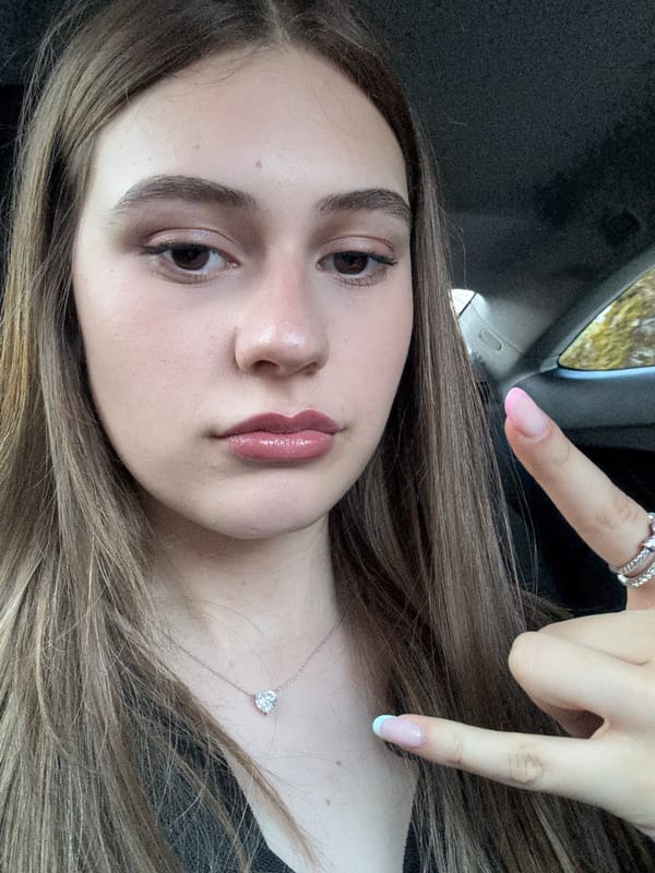 Woman takes playful car selfies in Baden-Baden