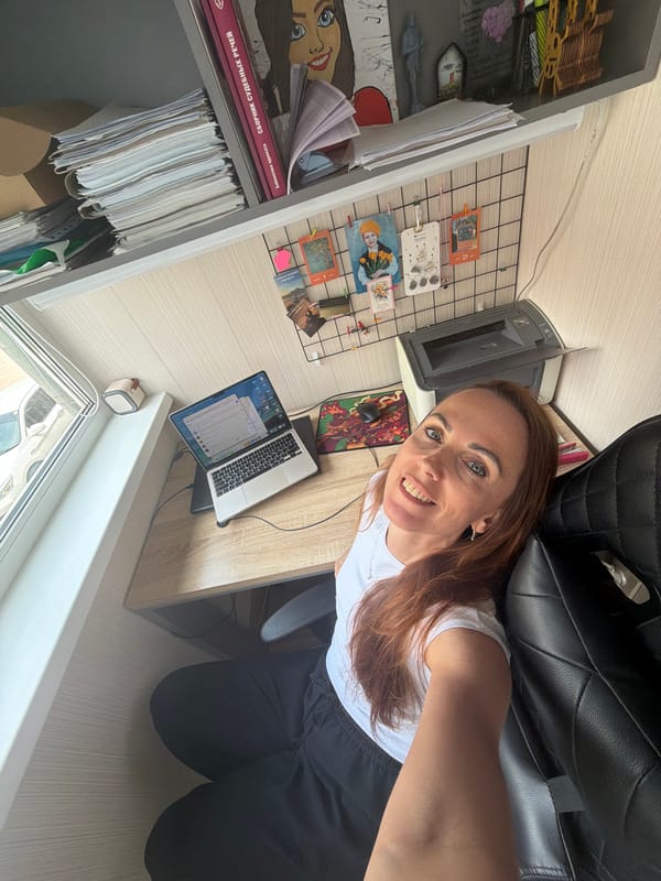 Selfie session at a home desk setup in Birobidzhan